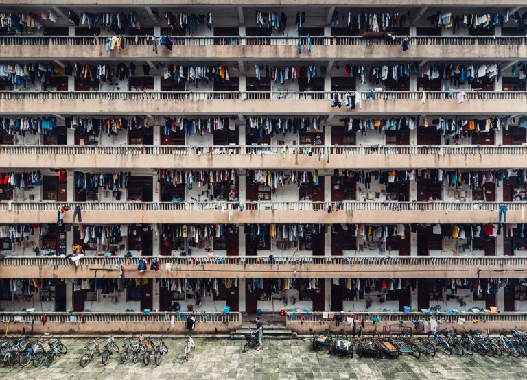 Cities Second Place Photo and caption by Wing Ka H. / National Geographic Travel Photographer of the Year Contest Silenced This photo was taken on my last trip to GuangZhou, China. This place is a school dormitories of South China Normal University. When I was hanging around, most of them were taking a break. After the lunch time, they need to go back to study. The dormitories were smelly and messy. At Mainland China university, students work like slaves or more like prisoners. Serious academic corruption, dry and irrelevant to society curriculum, and rote memorisation teaching methodsÓ were leading to students developing Òrigid ways of thinkingÓ, progressively losing interest in learning and ultimately emerging from university as Òsoulless zombiesÓ.